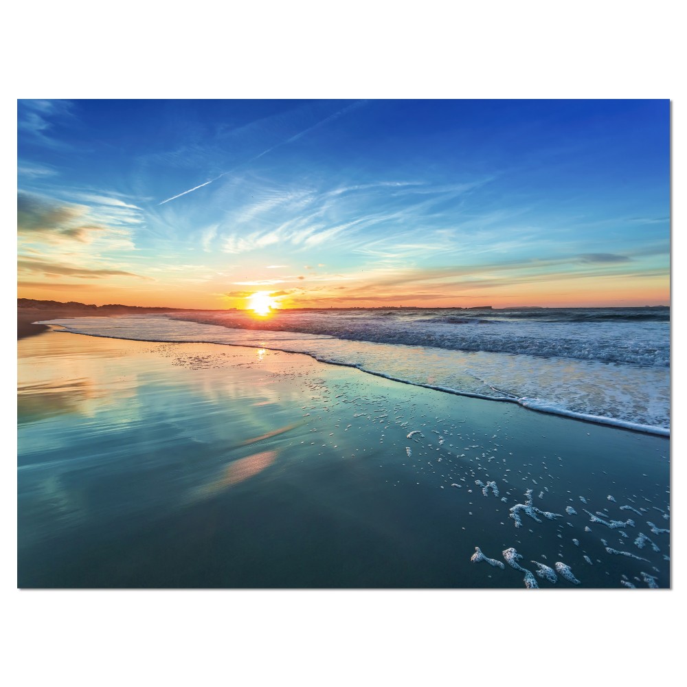 Designart Blue Seashore with Distant Sunset - Seascape Canvas Art Print